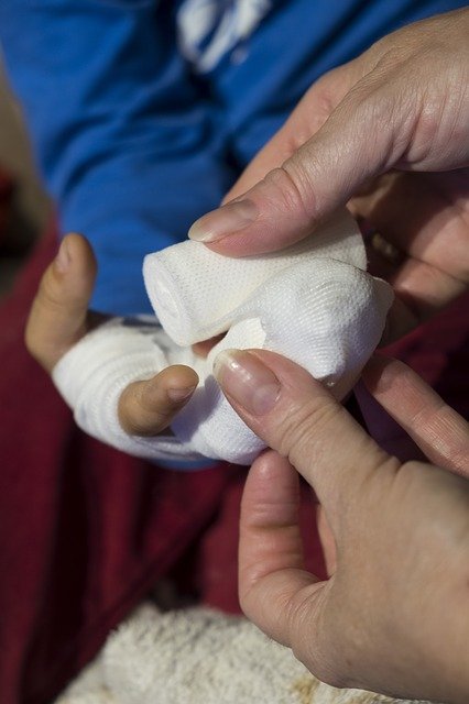 child getting wound taken care of